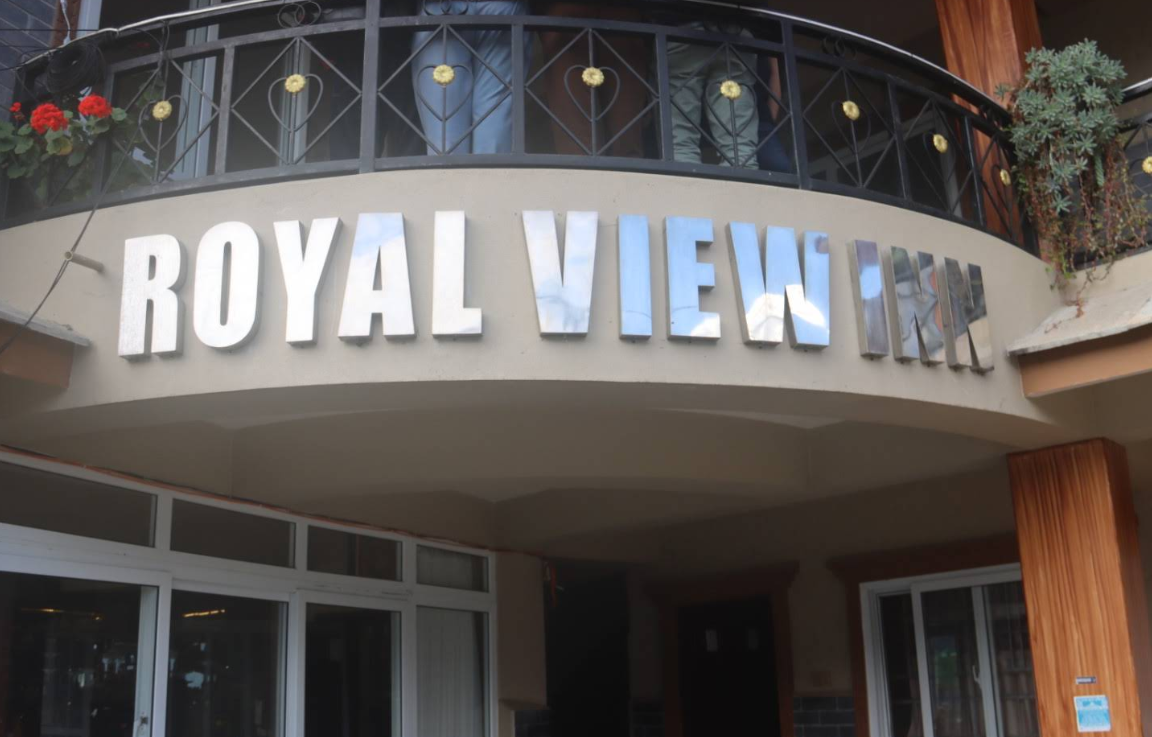 The stone entrance and balcony of Royal View Inn